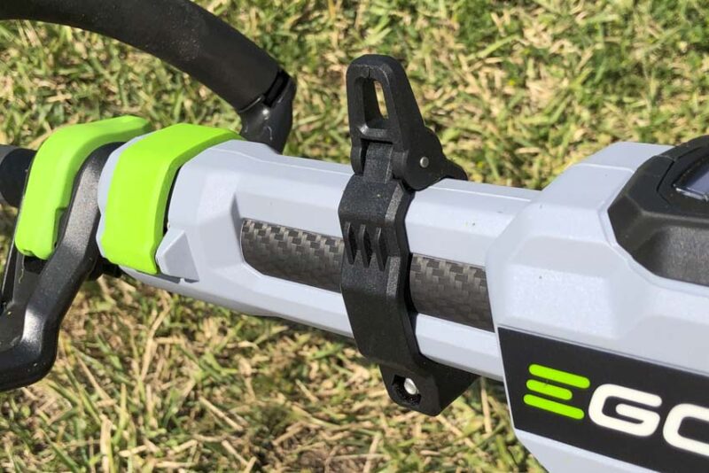 trimmer shoulder harness strap attachment point
