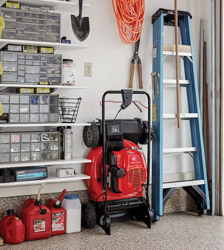 vertical storage system on a self propelled mower