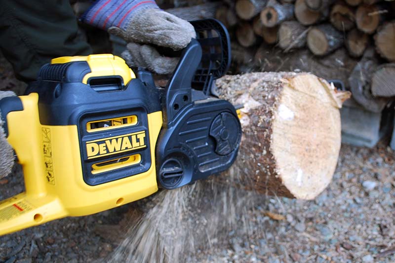 DeWalt 40V chain saw cutting